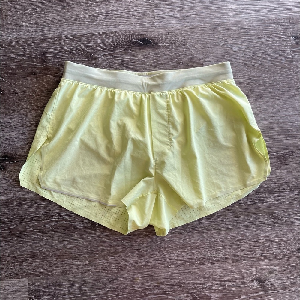 Lululemon Athletica Soft Yellow Perforated Shorts - Picture 1 of 6